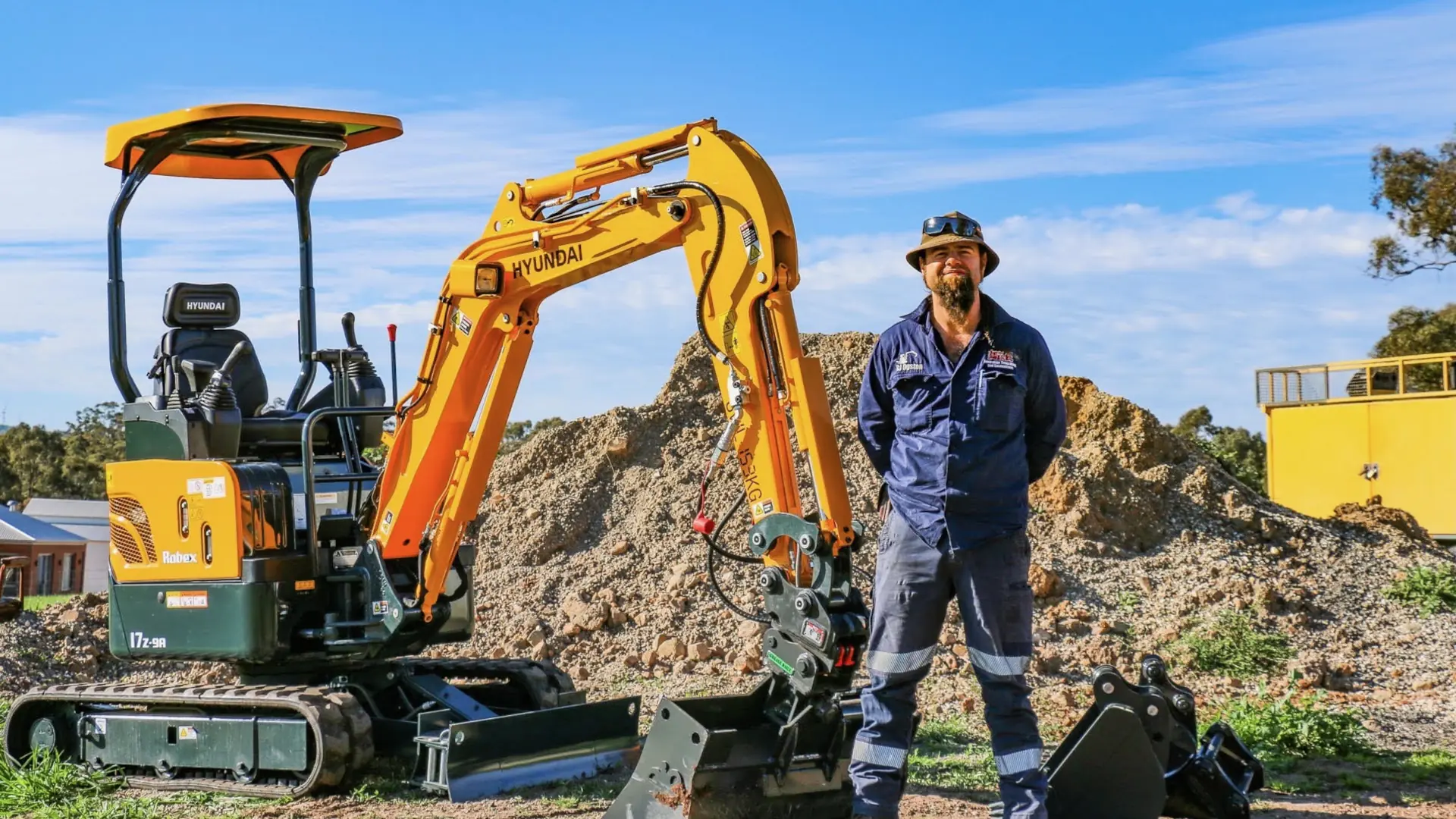 Australian Trenching and Excavations team member with Hyundai excavator